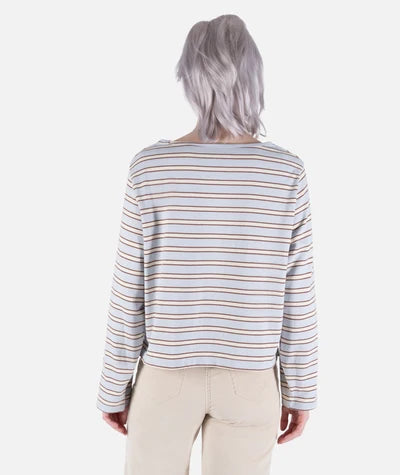 Jetty Hollis Striped Heavyweight Long Sleeve A person shown from the back wearing a long-sleeve cropped top with thin horizontal stripes in beige, brown, and white, paired with light beige pants, against a plain light gray background.