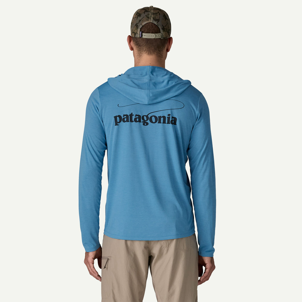 Patagonia Capilene Cool Daily Graphic Hoodie man wearing a blue hoodie with a fishing casting logo on back