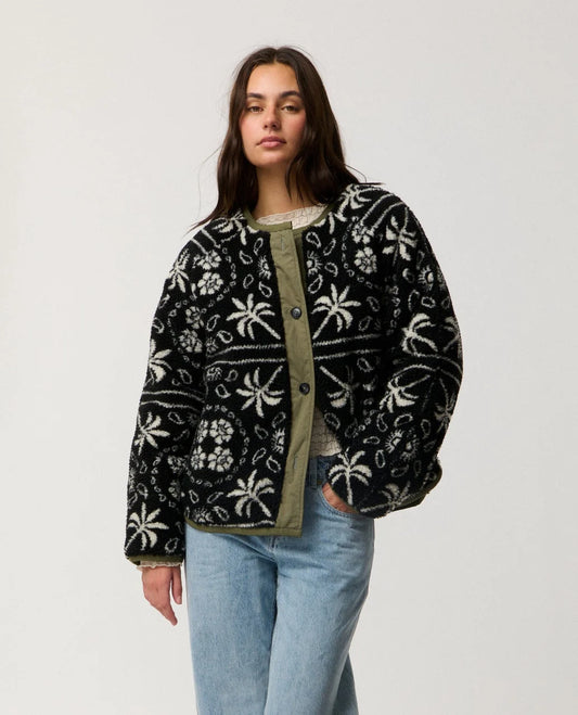 Rip Curl Bossa Nova Revo Jacket woman wearing reversible jacket with black on the outside