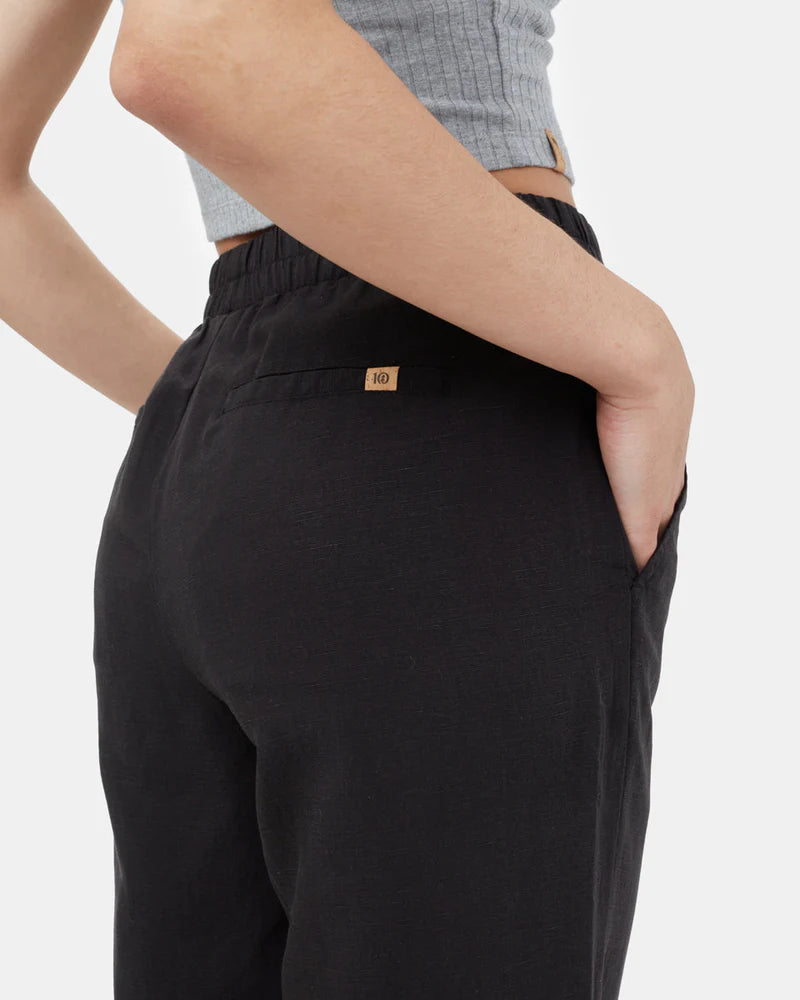 Tentree Billow Tree Linen pant Person wearing black pants with a brand logo on a light gray background
