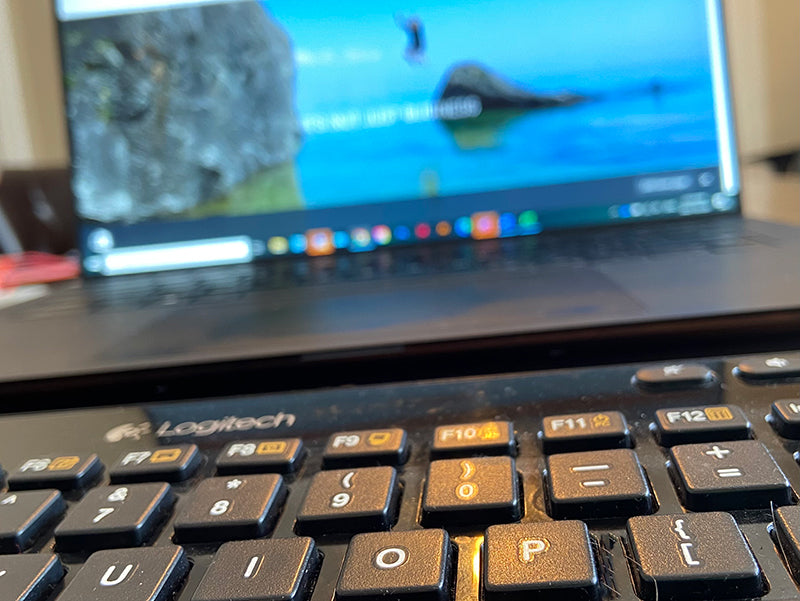 Computer and keyboard illustrating CHANGE Lifestyle & Apparel website
