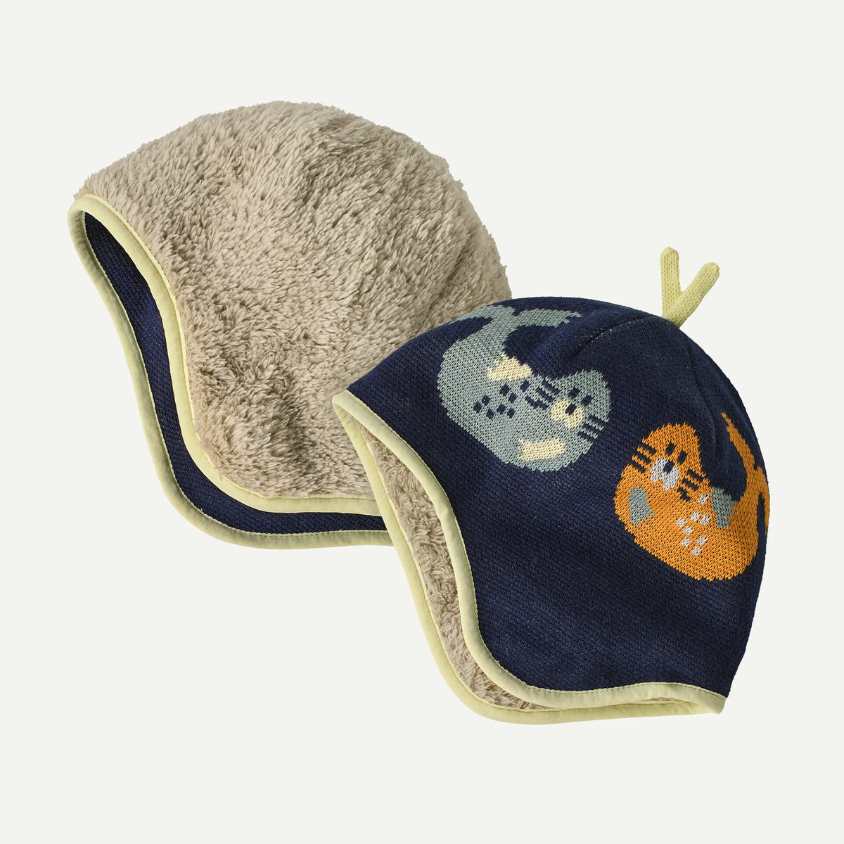 a reversible  youth beanie with blue on one side and tan on the other