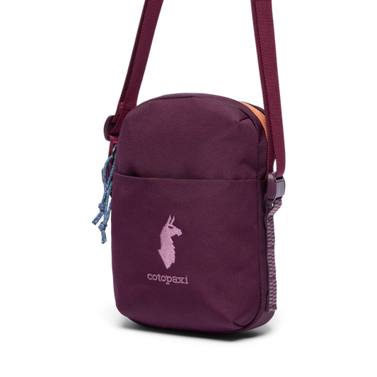 Purple crossbody bag with a brand logo on a white background