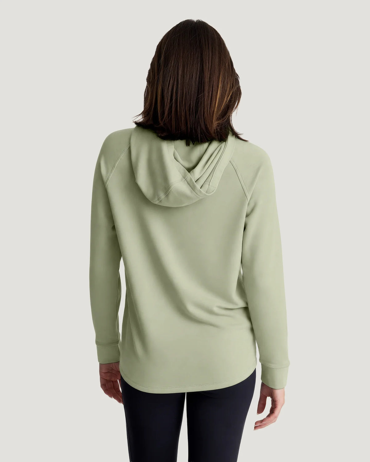 A back view of a soman wearing a bamboo hoodie