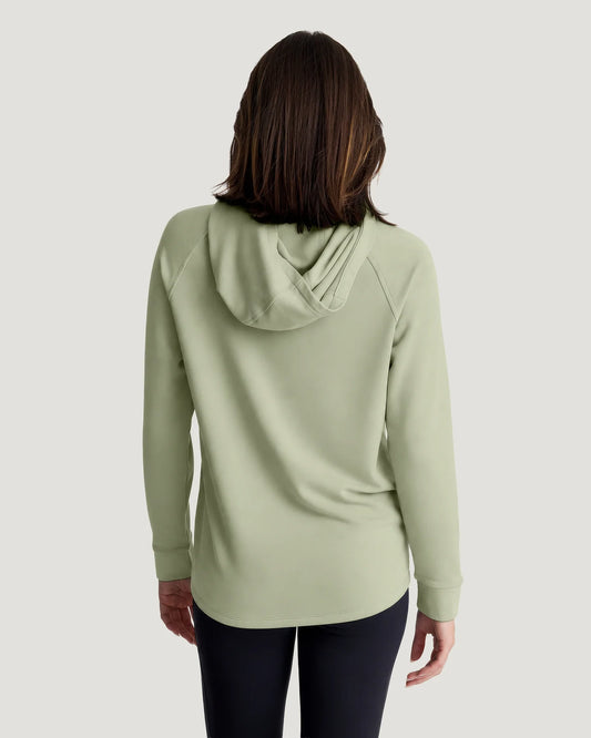 A back view of a soman wearing a bamboo hoodie
