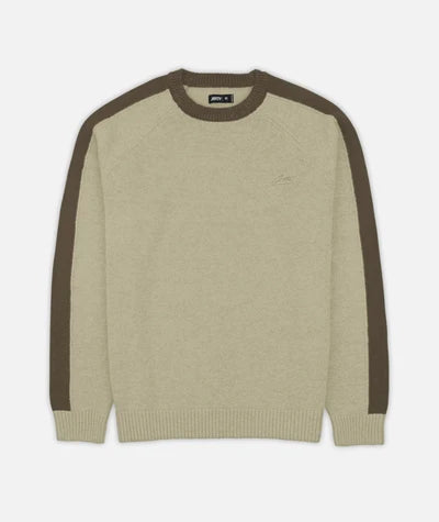 tan coloured sweater with a brown stripe on shoulder and arms