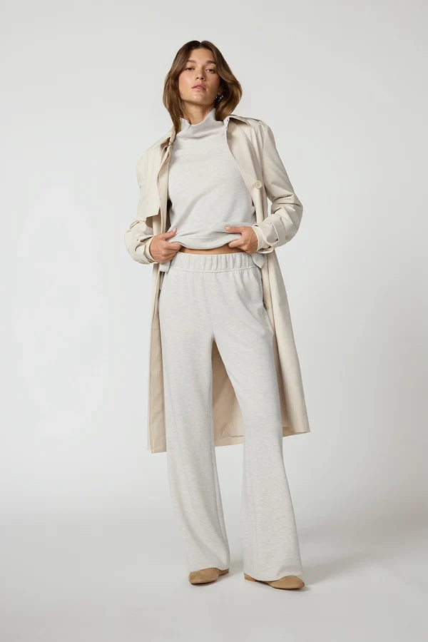 MPG  Dreamweave Relaxed Pants woman wearing moonbeam comfort pants and long jacket.