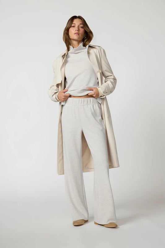 MPG  Dreamweave Relaxed Pants woman wearing moonbeam comfort pants and long jacket.