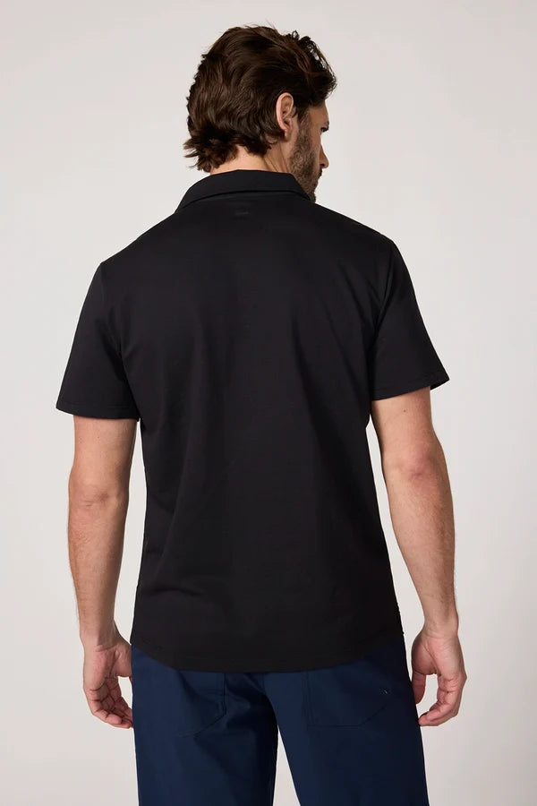 MPG Revive Short Sleeve Polo Man back view of a man wearing black polo shirt