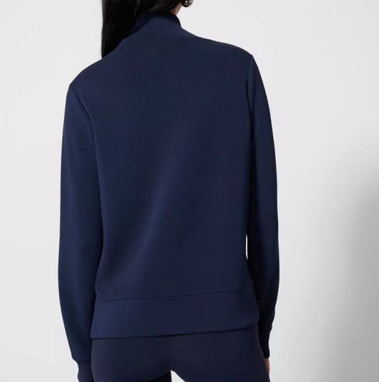 Navy blue jacket worn by a person on a white background