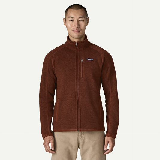 Patagonia Better Sweater Jacket a man stands wearing a full zip fleece jacket.