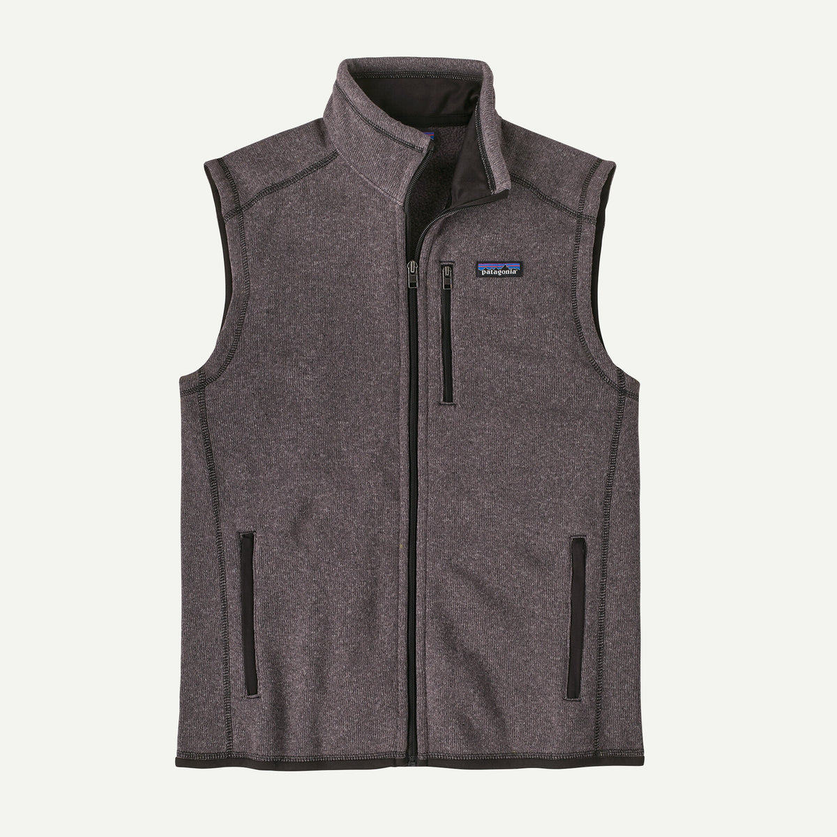 A grey better sweater vest lies on a white back ground