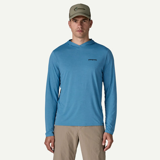 Patagonia Capilene Cool Daily Graphic Hoodie a man wearing a blue hoodie with Patagonia logo