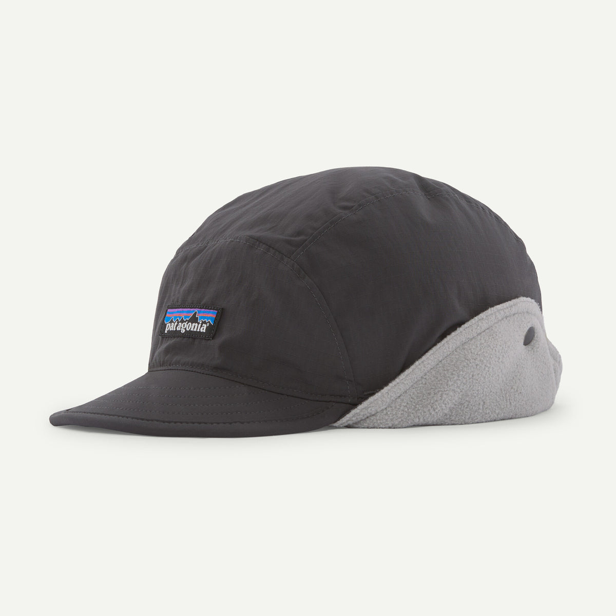 A black winter cap with grey earflaps