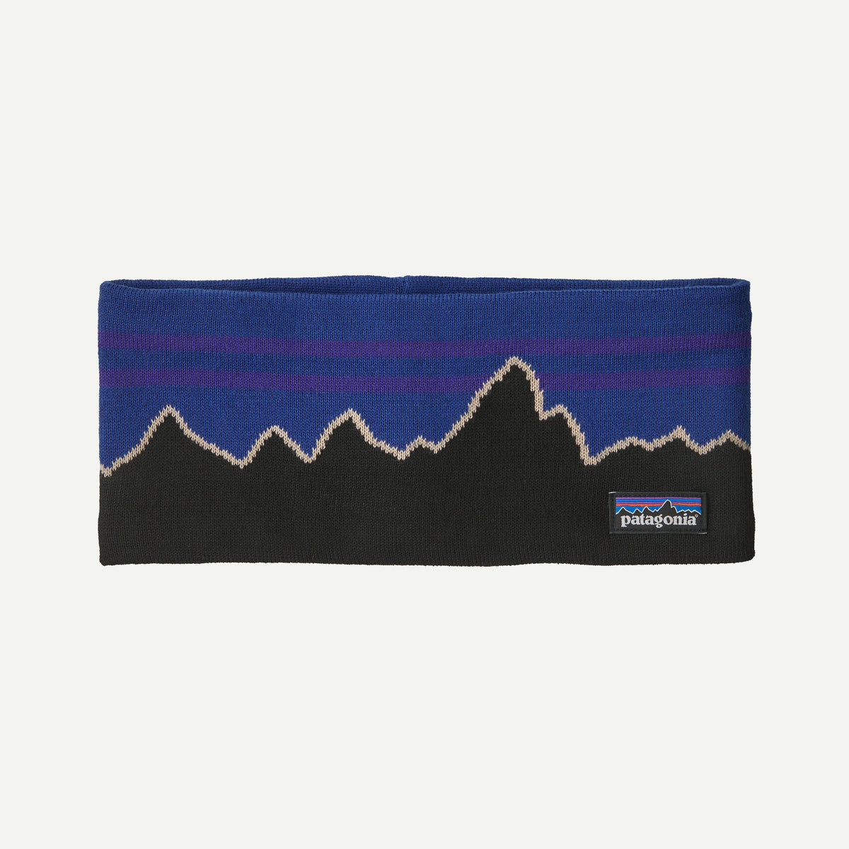 A blue and black headband with a mountain range design on a white background.