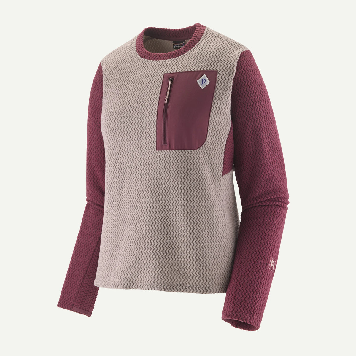 grey waffle knit sweater with Mauve sleeves and a front zip pocket