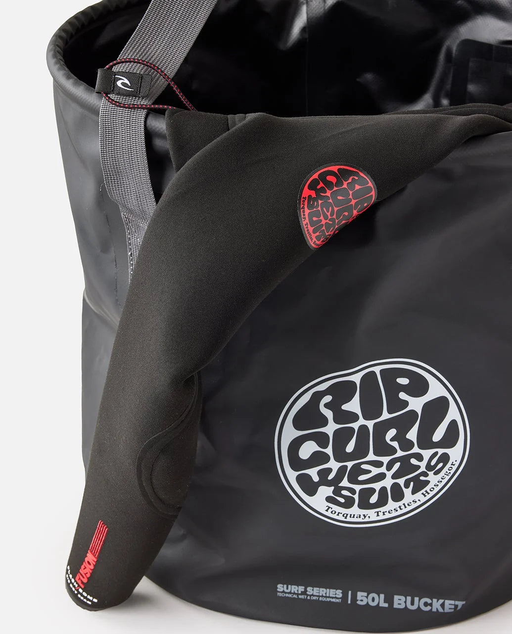 Rip Curl 50L Bucket Black surf bag with Rip Curl logo and red accents on a white background