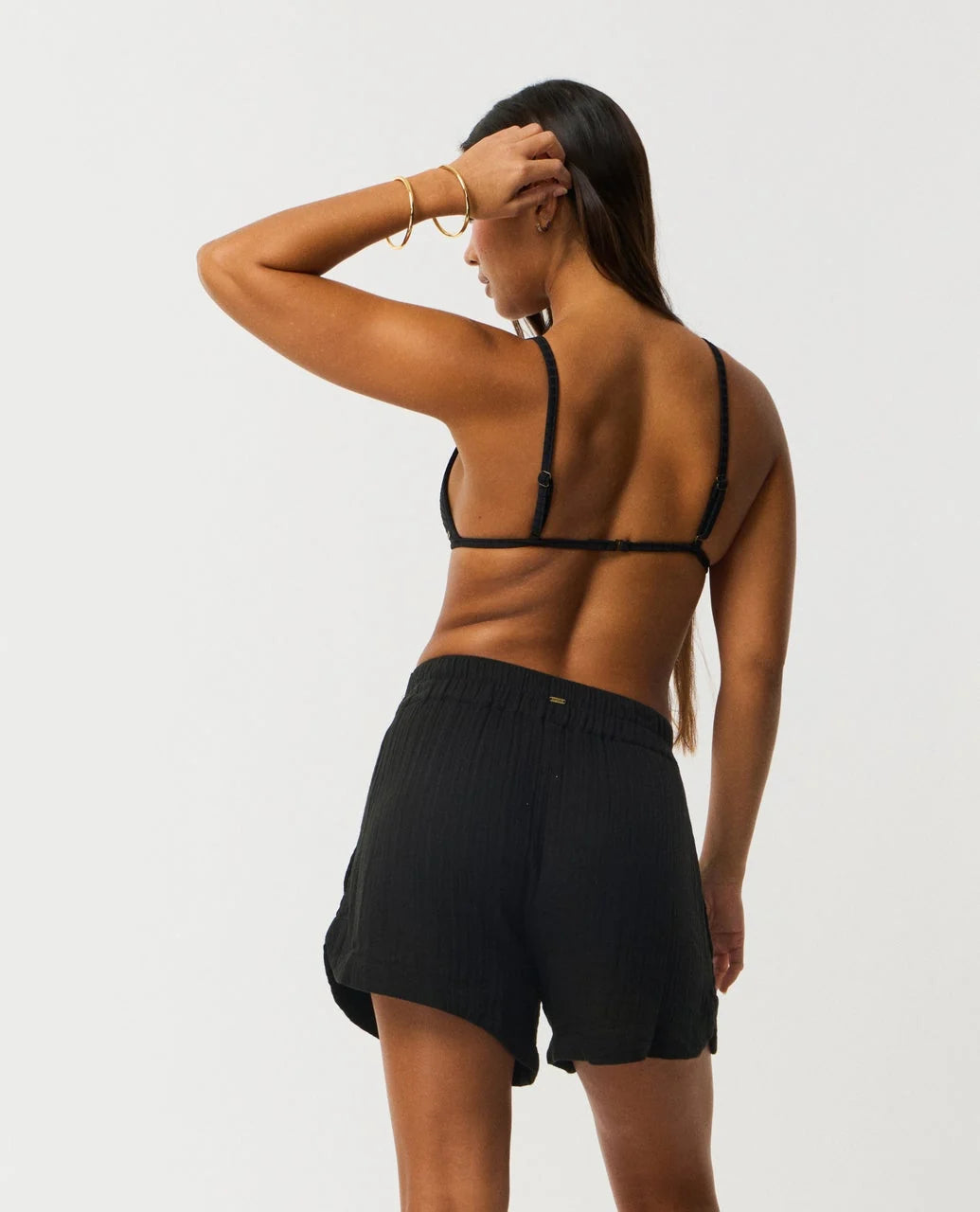Rip Curl Premium Surf Short Person wearing a black sports bra and shorts on a white background