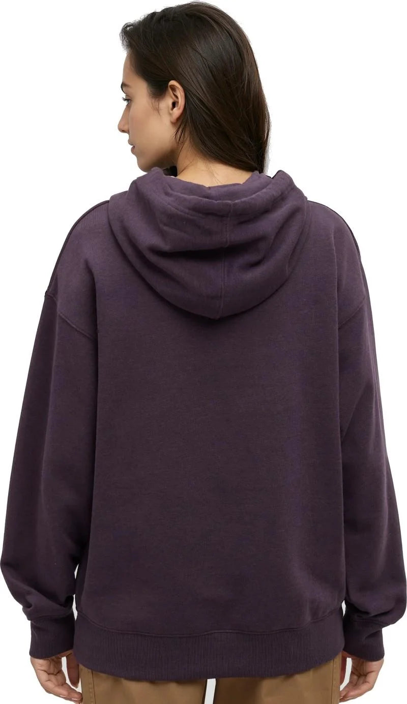 Tentree Field Foliage Hoodie A woman shown from the back wearing an oversized dark purple hoodie, paired with tan pants, against a plain white background.