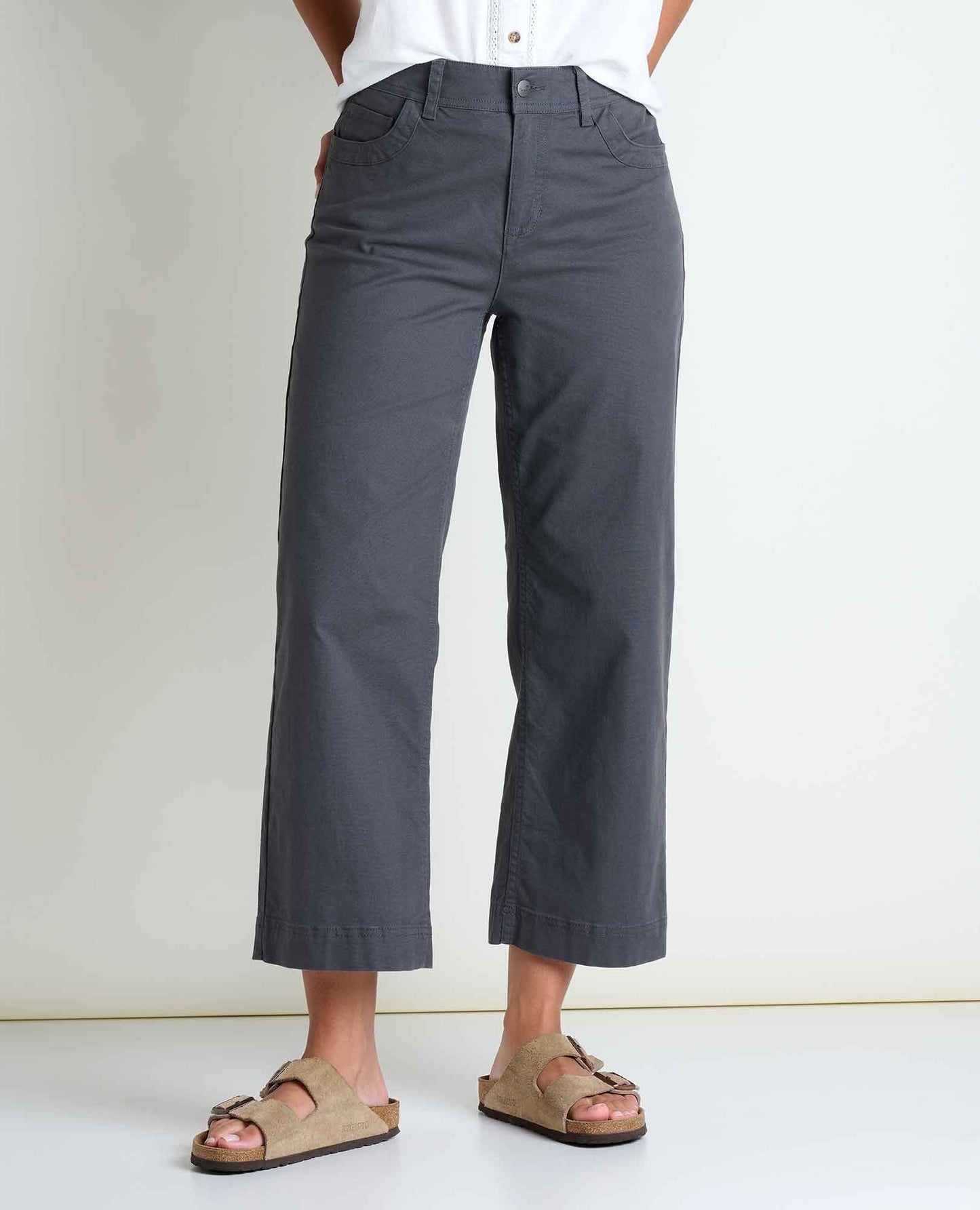 Toad and Co Earthworks Wide Leg Crop Pant Soot Person wearing gray pants and sandals on a white background