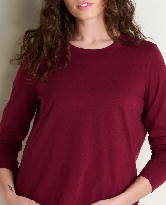 toad and co re form long sleeve crew woman wearing burgundy long sleeve shirt 