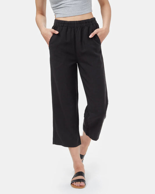 Tentree Billow Tree Linen pant. Person wearing black wide-leg pants on a white background